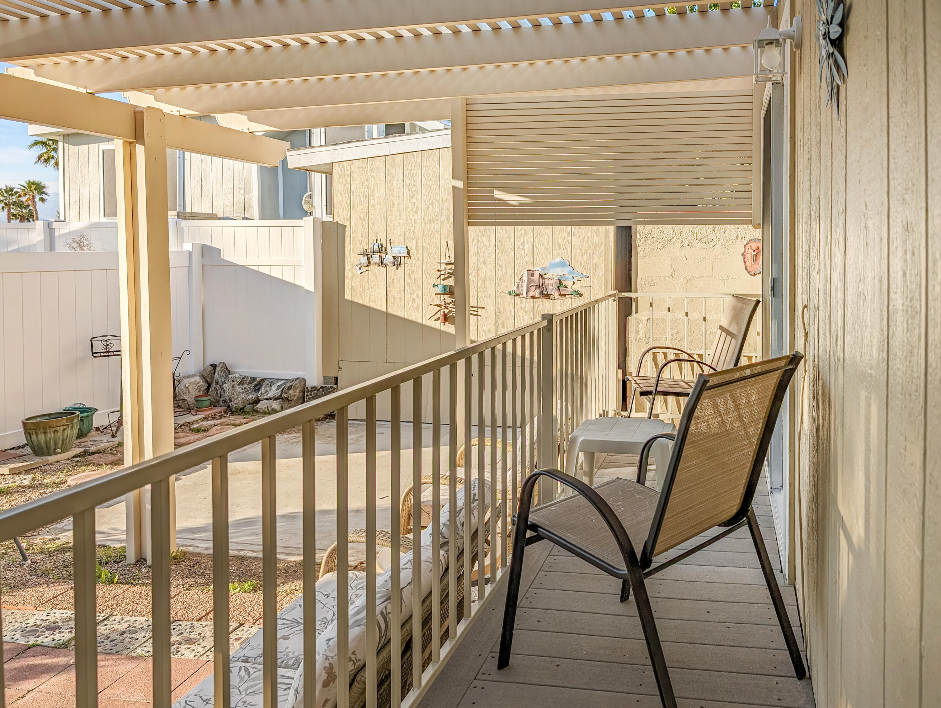 70200 Dillon Road, Unit 111 Desert Hot Springs, CA 92241 - Photo 13 of 25 a view of a balcony with furniture