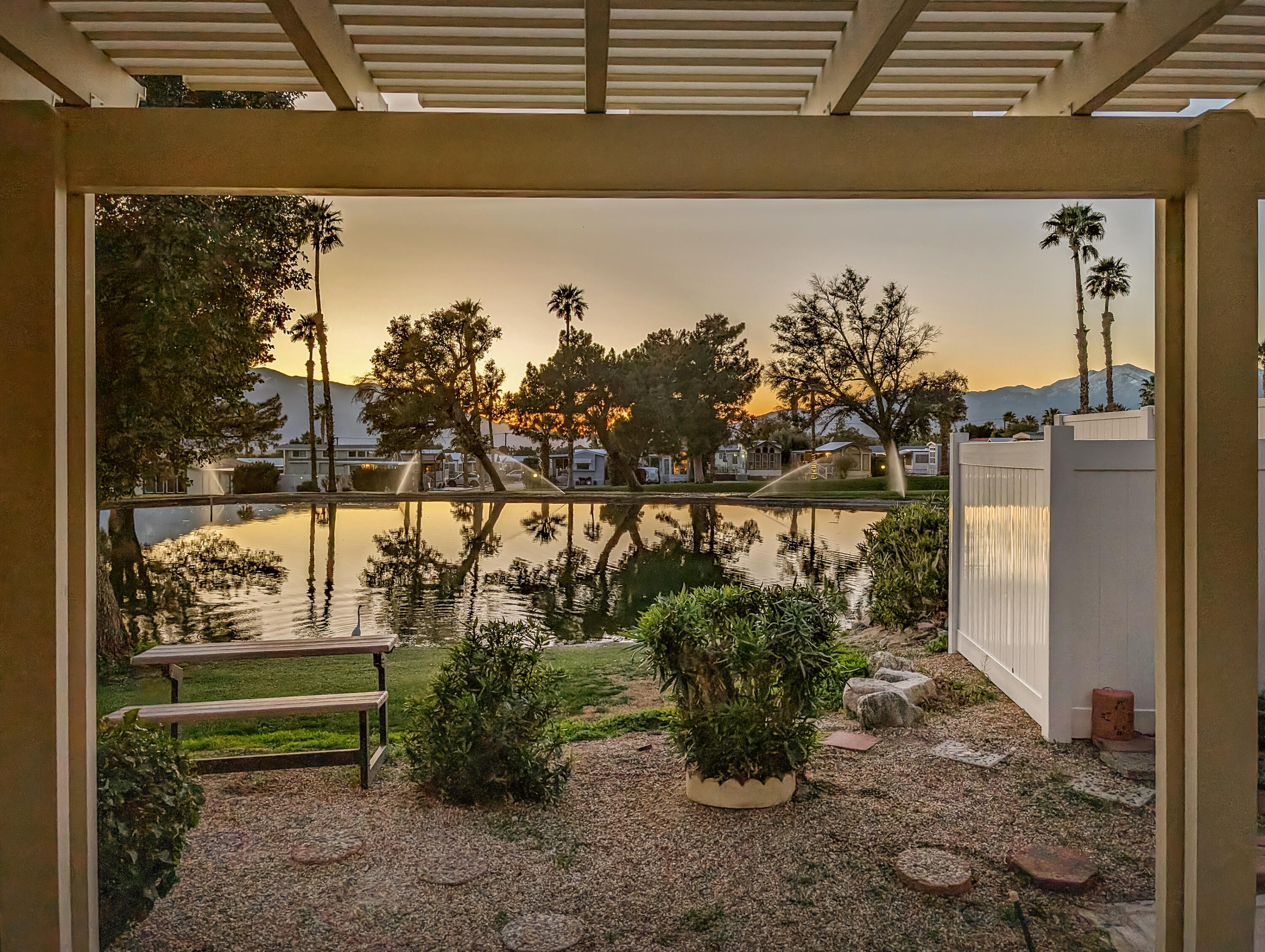 70200 Dillon Road, Unit 111 Desert Hot Springs, CA 92241 - Photo 15 of 25 a view of a porch with a potted plant