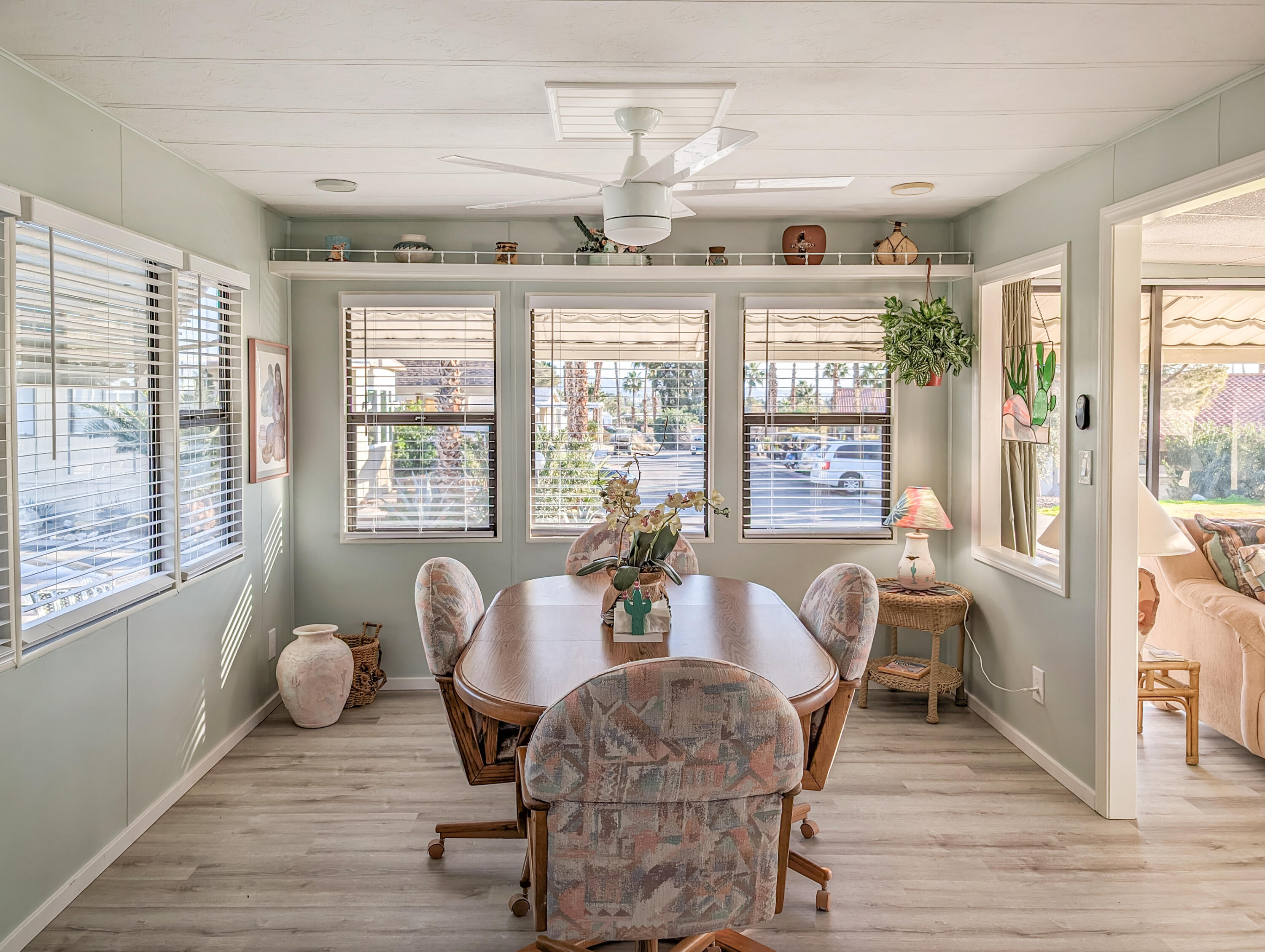 70200 Dillon Road, Unit 111 Desert Hot Springs, CA 92241 - Photo 5 of 25 a living room with furniture and a large window