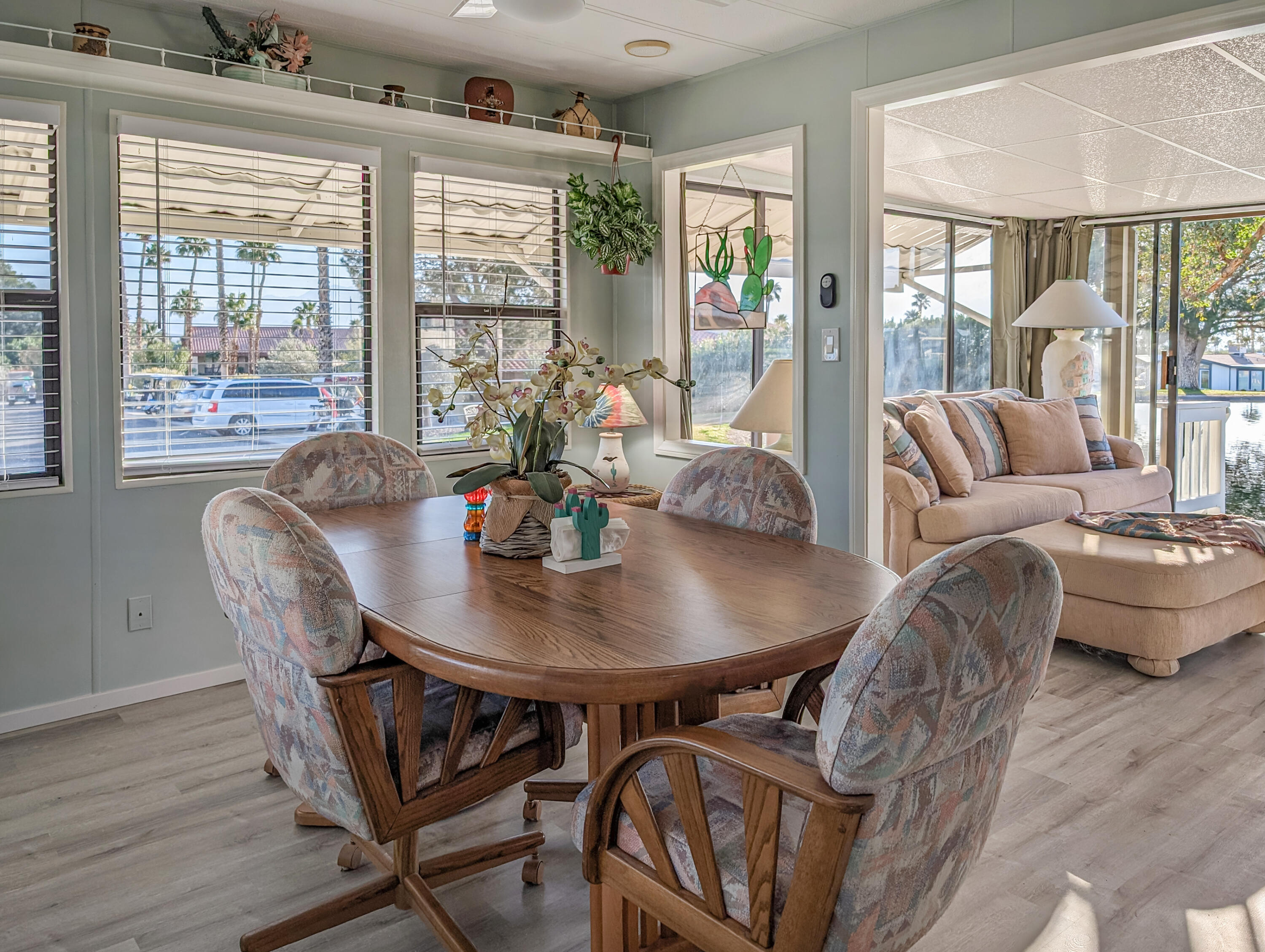 70200 Dillon Road, Unit 111 Desert Hot Springs, CA 92241 - Photo 6 of 25 a view of a dining room with furniture window and outside view