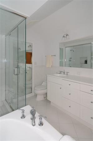 36 Pinecroft Road Weston, MA 02493 - Photo 12 of 19 a bathroom with a sink toilet and shower