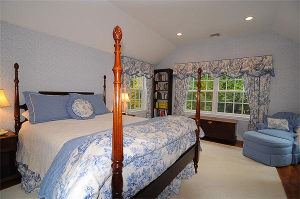 36 Pinecroft Road Weston, MA 02493 - Photo 13 of 19 a bedroom with a large bed and a window
