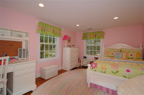 36 Pinecroft Road Weston, MA 02493 - Photo 14 of 19 a bedroom with a bed dresser and a window