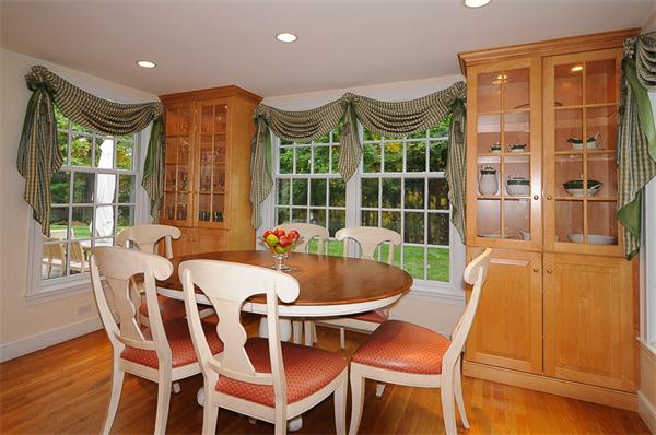 36 Pinecroft Road Weston, MA 02493 - Photo 7 of 19 a view of a dining room with furniture window and wooden floor