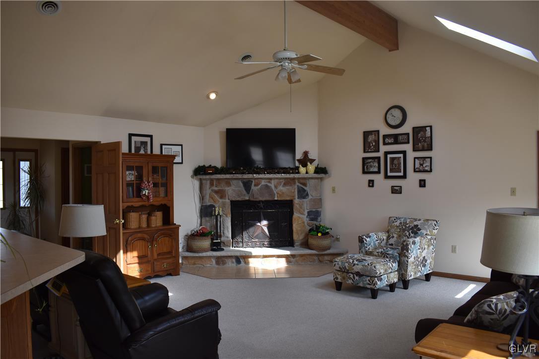 5869 Spangler Road Nazareth, PA 18064 - Photo 17 of 33 a living room with furniture fireplace and flat screen tv