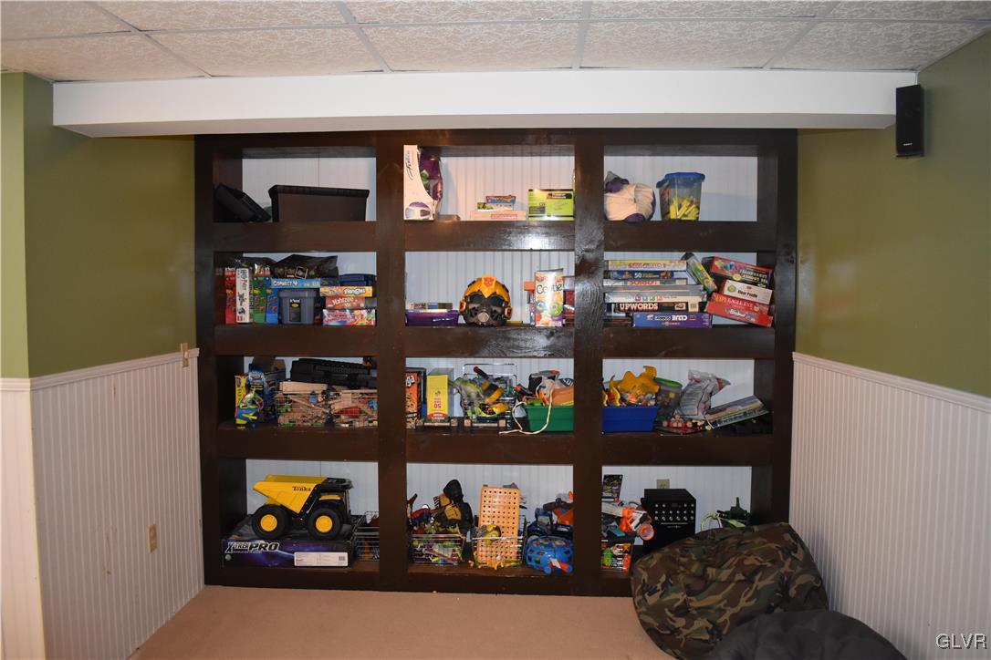 5869 Spangler Road Nazareth, PA 18064 - Photo 23 of 33 a room with lots of different kinds of books