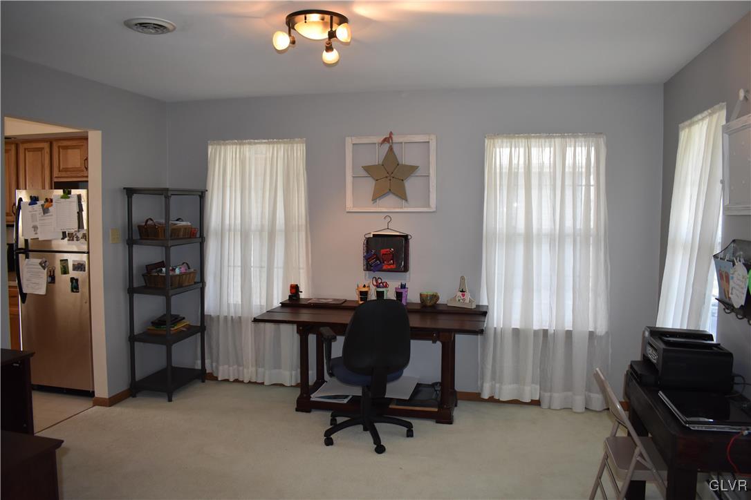 5869 Spangler Road Nazareth, PA 18064 - Photo 24 of 33 a view of a workspace with furniture and a window