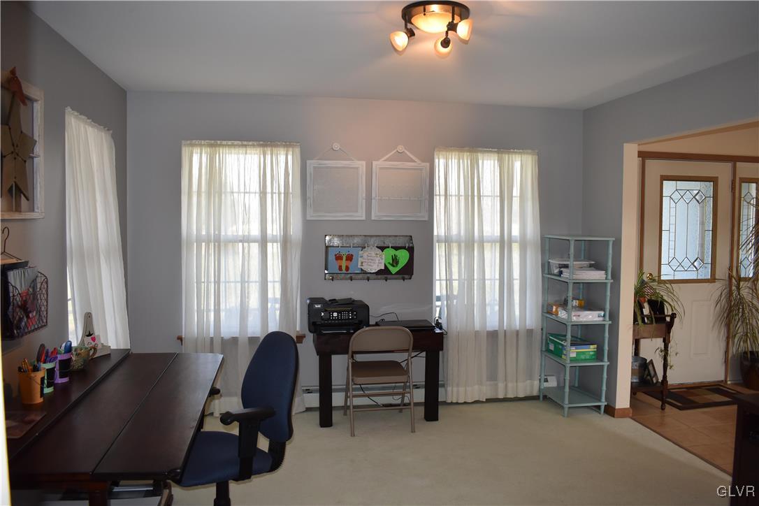 5869 Spangler Road Nazareth, PA 18064 - Photo 25 of 33 a view of a workspace with furniture and a window
