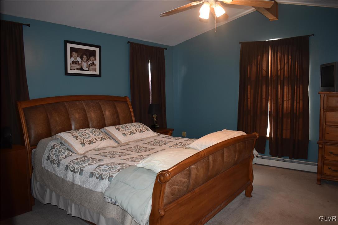 5869 Spangler Road Nazareth, PA 18064 - Photo 26 of 33 a bed sitting in a bedroom next to a window