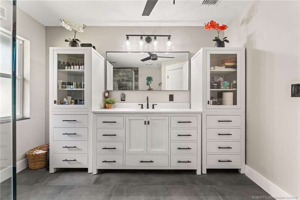 2072 Southeast Hanford Road Port St. Lucie, FL 34952 - Photo 40 of 58 a view of cabinets