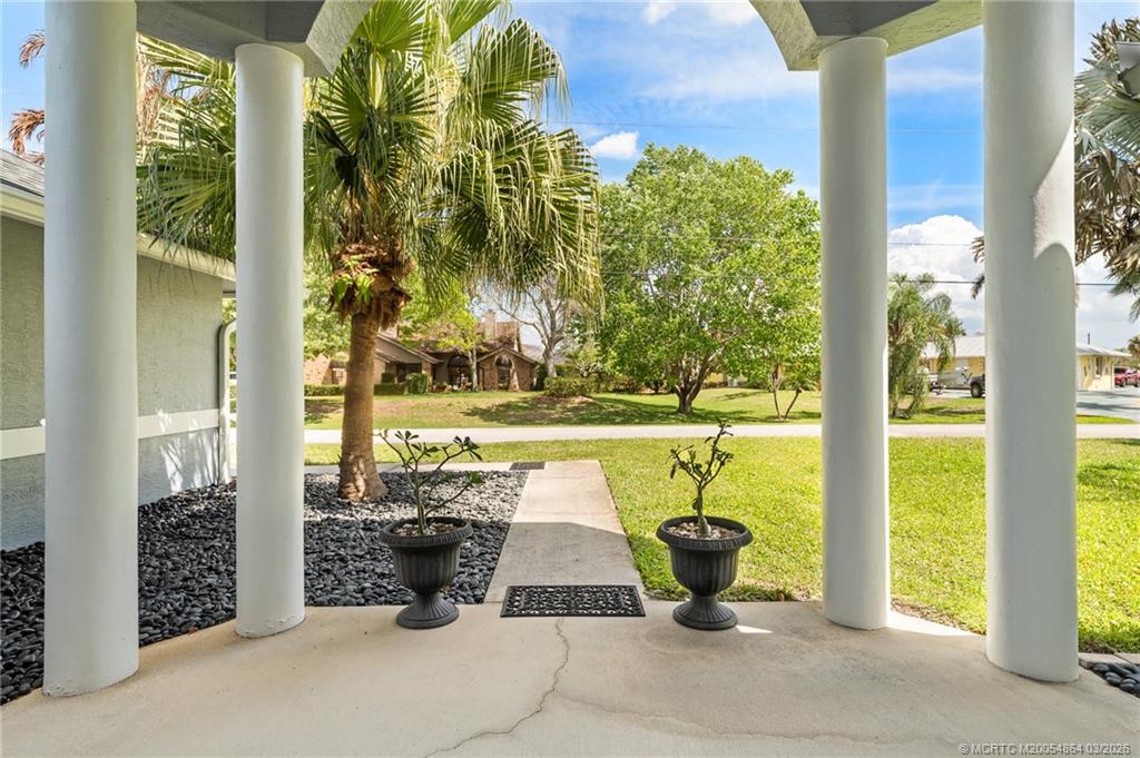 2072 Southeast Hanford Road Port St. Lucie, FL 34952 - Photo 4 of 58 a view of an outdoor space and deck