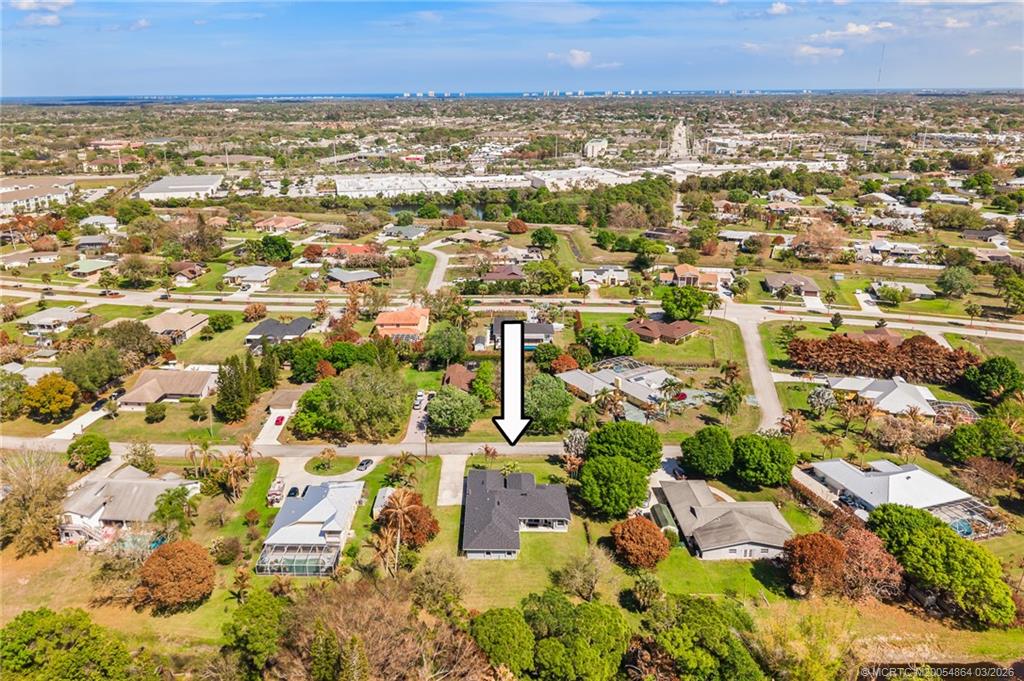 2072 Southeast Hanford Road Port St. Lucie, FL 34952 - Photo 53 of 58 an aerial view of residential building with parking