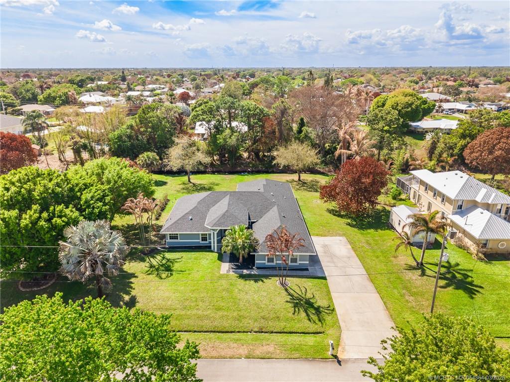 2072 Southeast Hanford Road Port St. Lucie, FL 34952 - Photo 55 of 58 an aerial view of residential houses with outdoor space