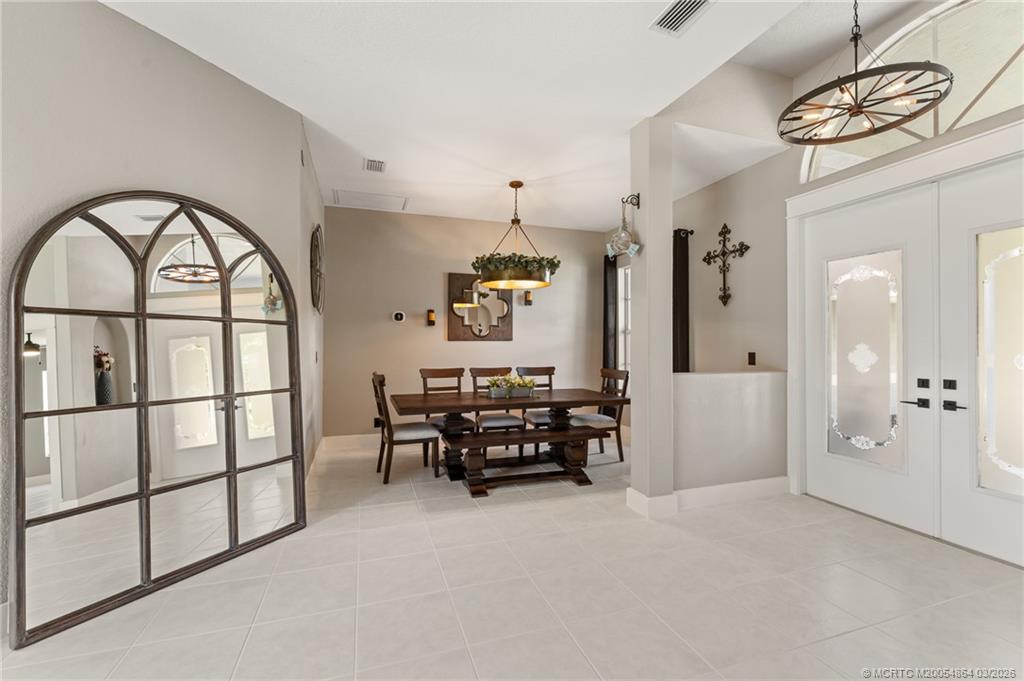 2072 Southeast Hanford Road Port St. Lucie, FL 34952 - Photo 8 of 58 a view of a livingroom with furniture and a window