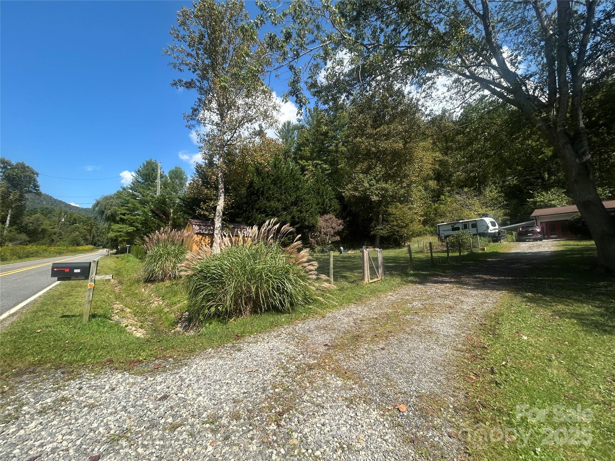 283 Bull Creek Road Asheville, NC 28805 - Photo 29 of 35 a view of swimming pool with a yard