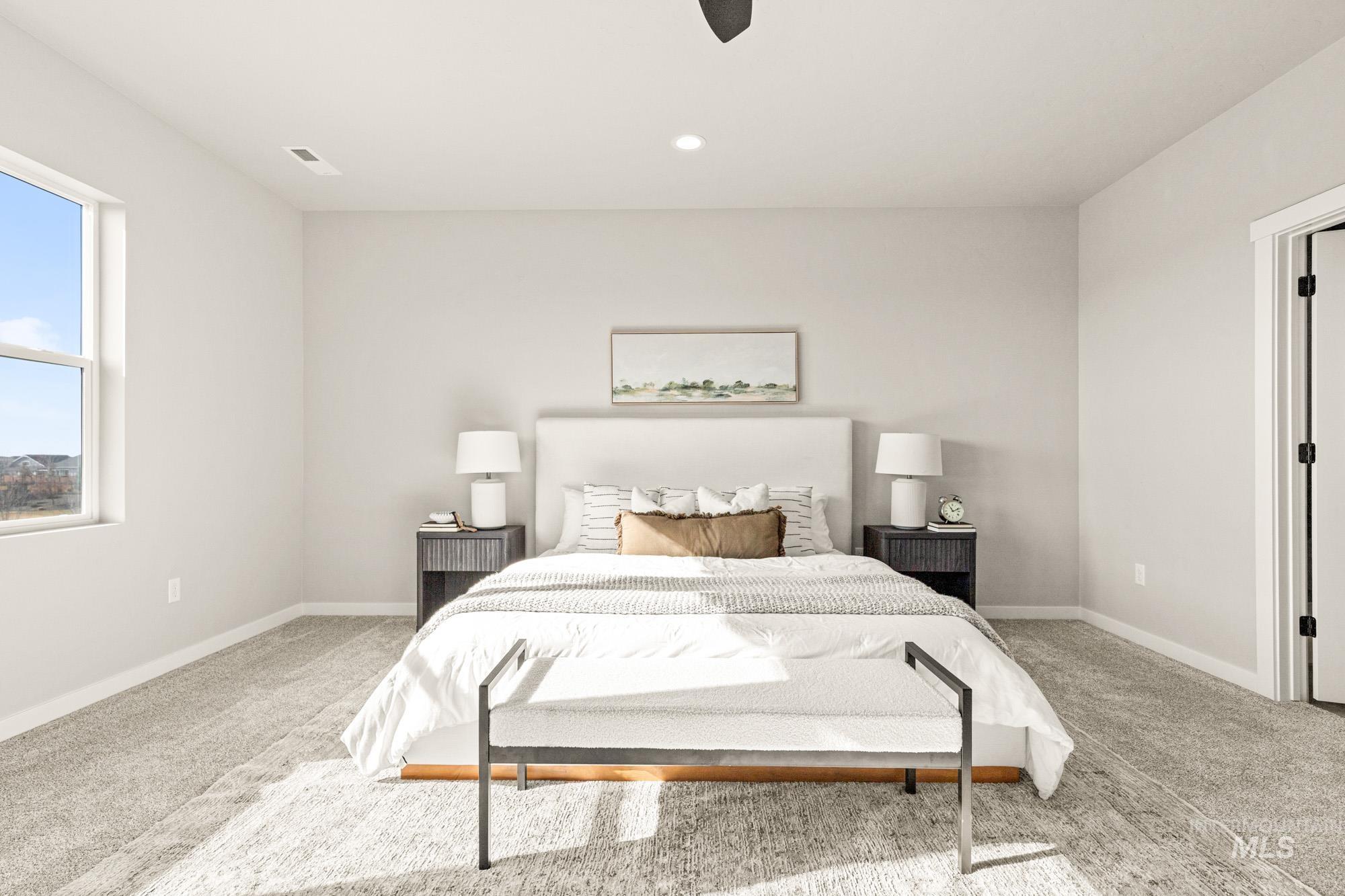 5487 West Yarnell Street Eagle, ID 83616 - Photo 19 of 30 Carpeted bedroom with a ceiling fan and recessed lighting
