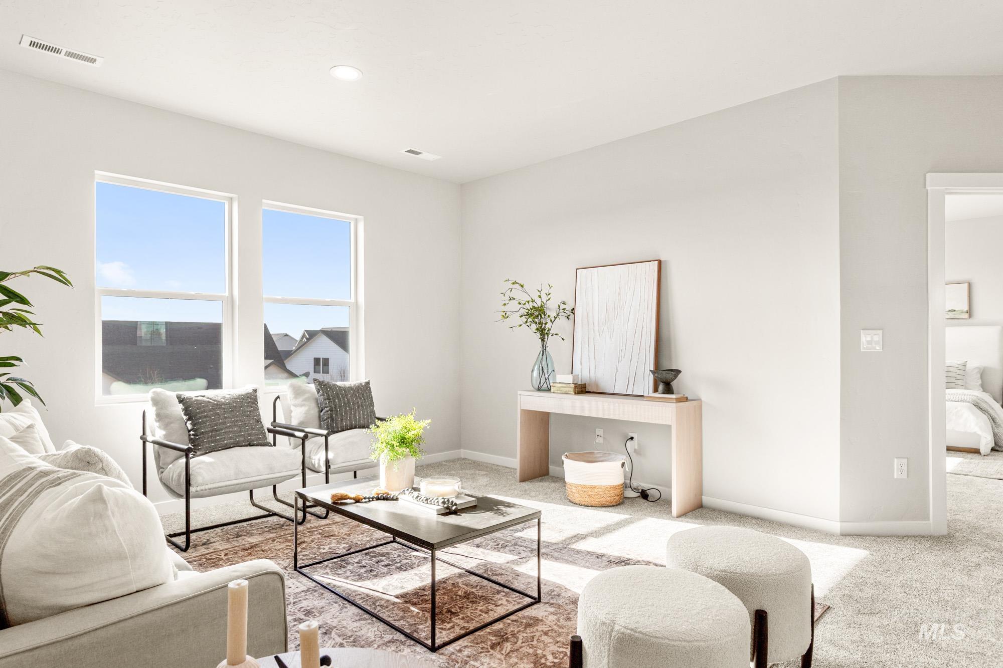5487 West Yarnell Street Eagle, ID 83616 - Photo 25 of 30 Living room featuring carpet flooring and recessed lighting