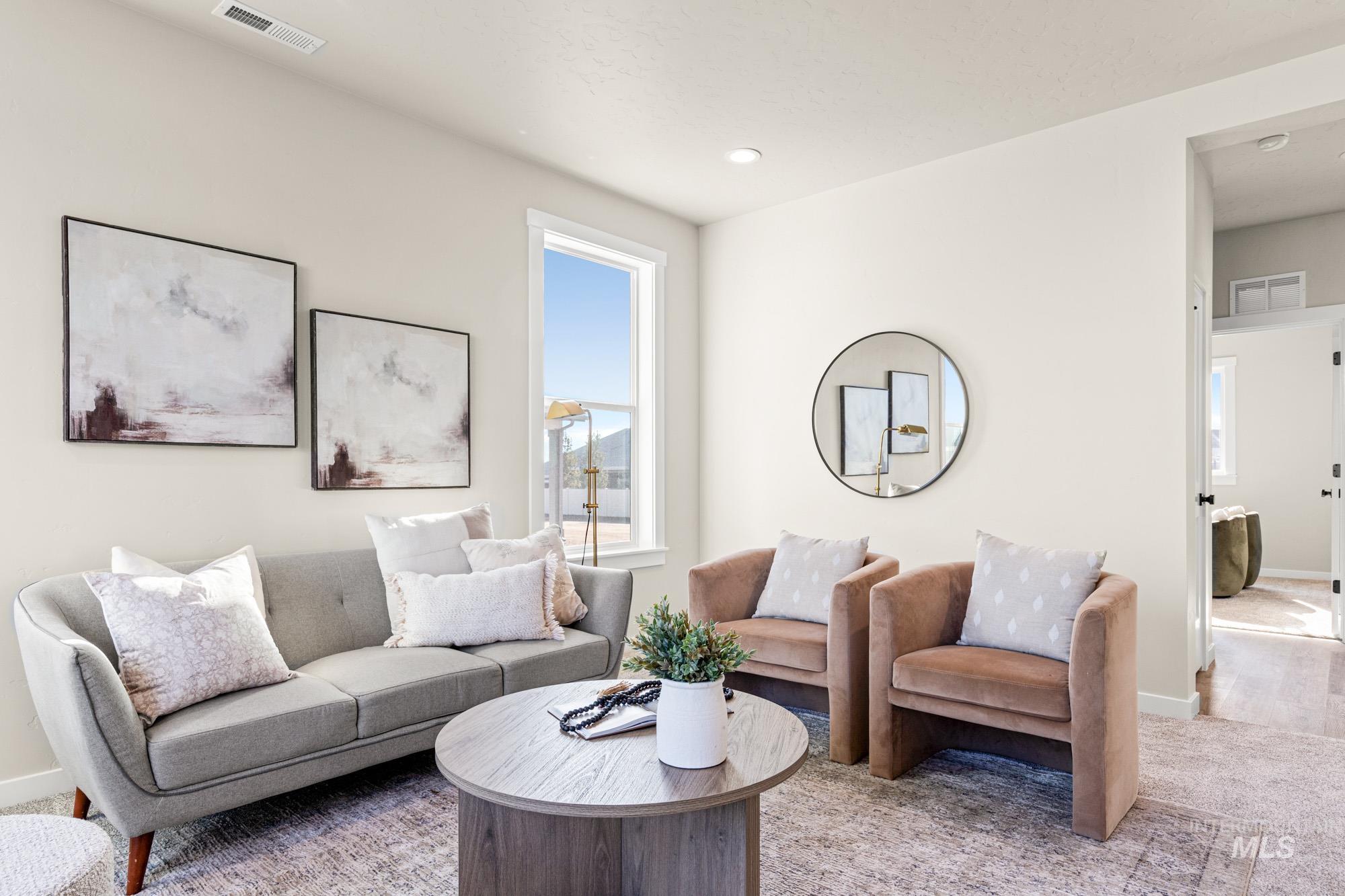 5487 West Yarnell Street Eagle, ID 83616 - Photo 4 of 30 Living room featuring recessed lighting and carpet
