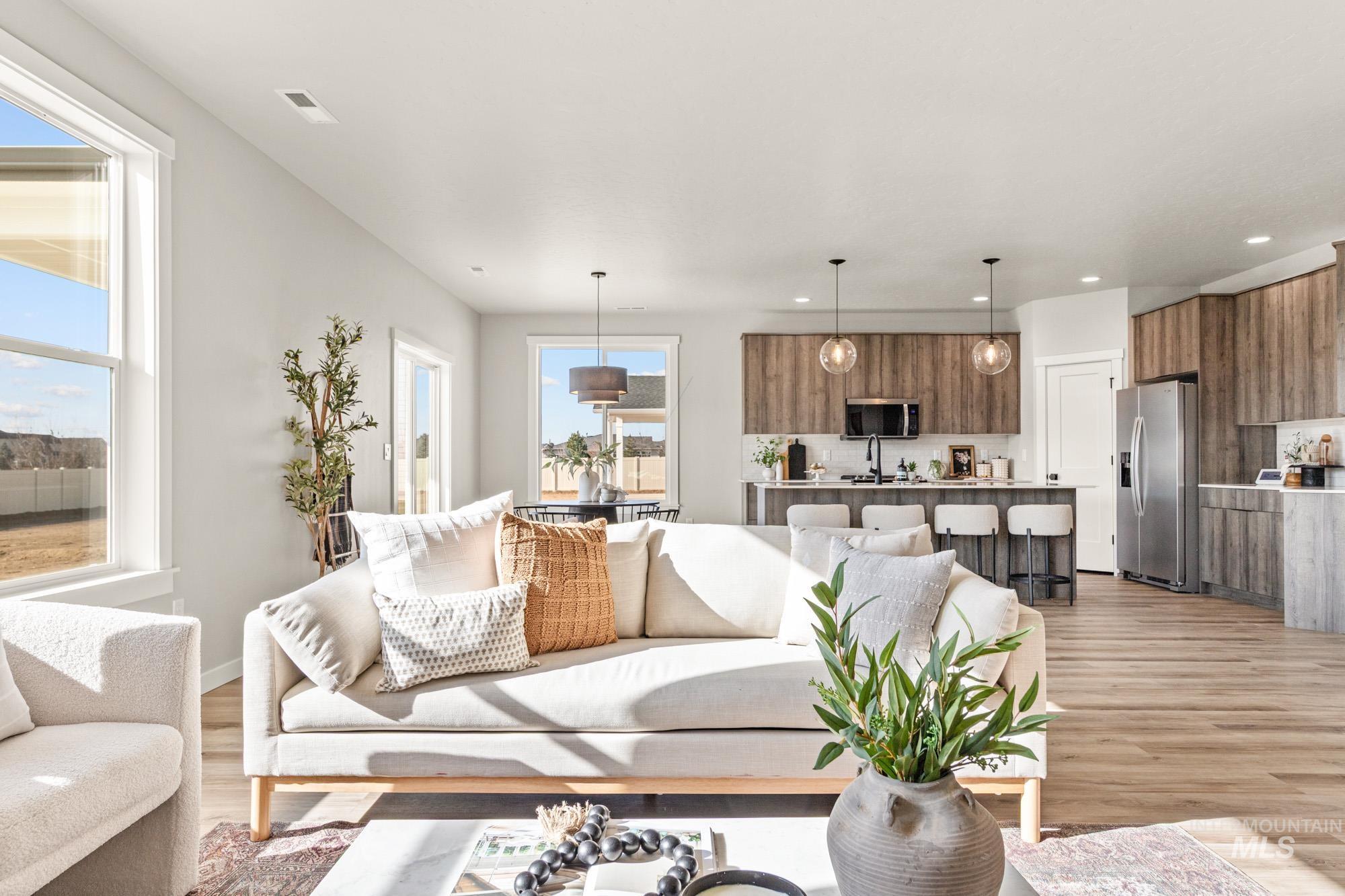 5487 West Yarnell Street Eagle, ID 83616 - Photo 10 of 30 Living room featuring light wood-style floors and recessed lighting