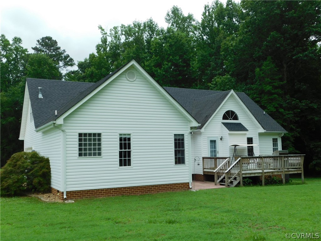18780 Templeton Road Disputanta, VA 23842 - Photo 6 of 38 a front view of house with yard and green space