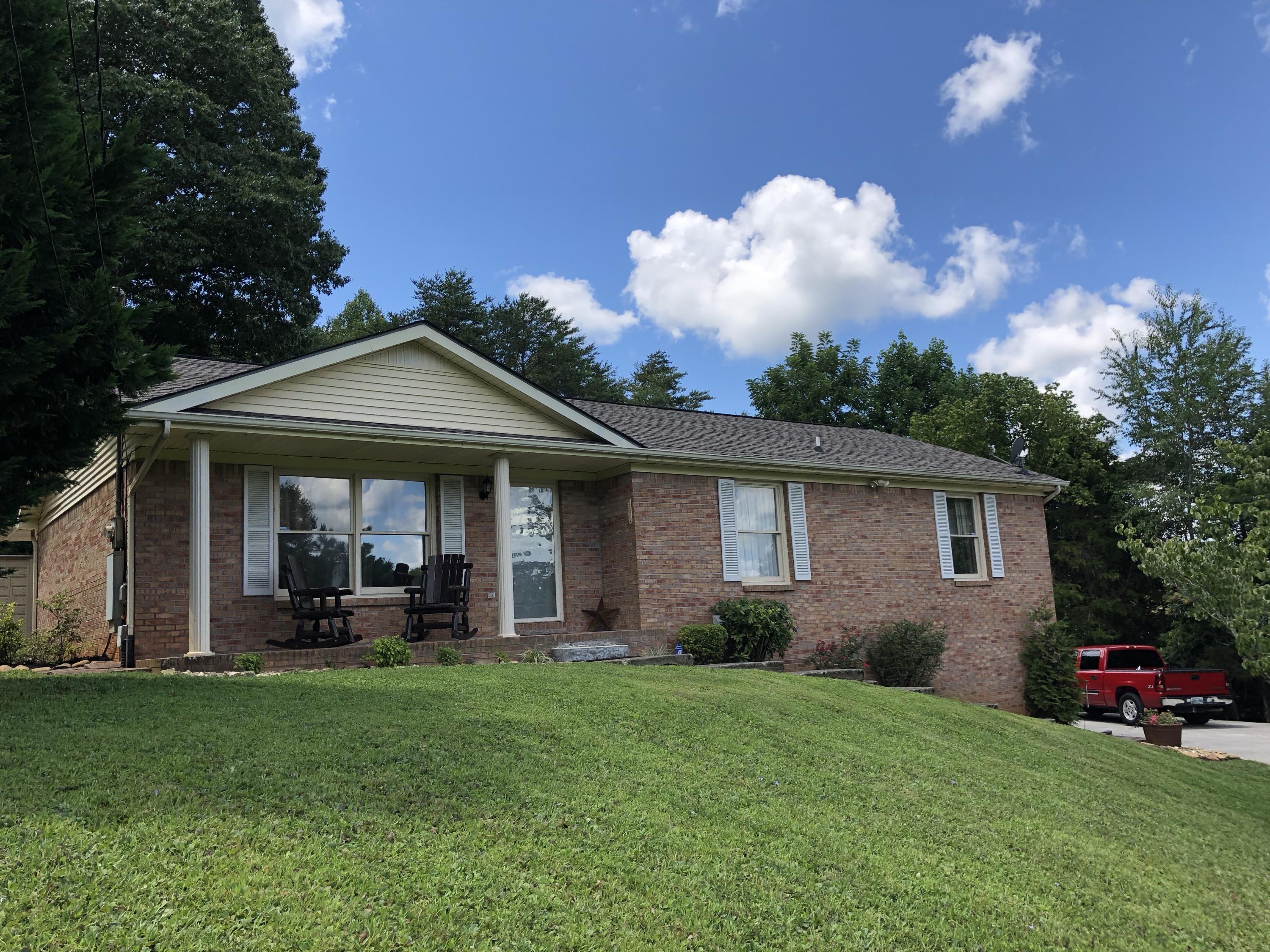 214 Den Lane Heiskell, TN 37754 - Photo 3 of 40 front from left side
