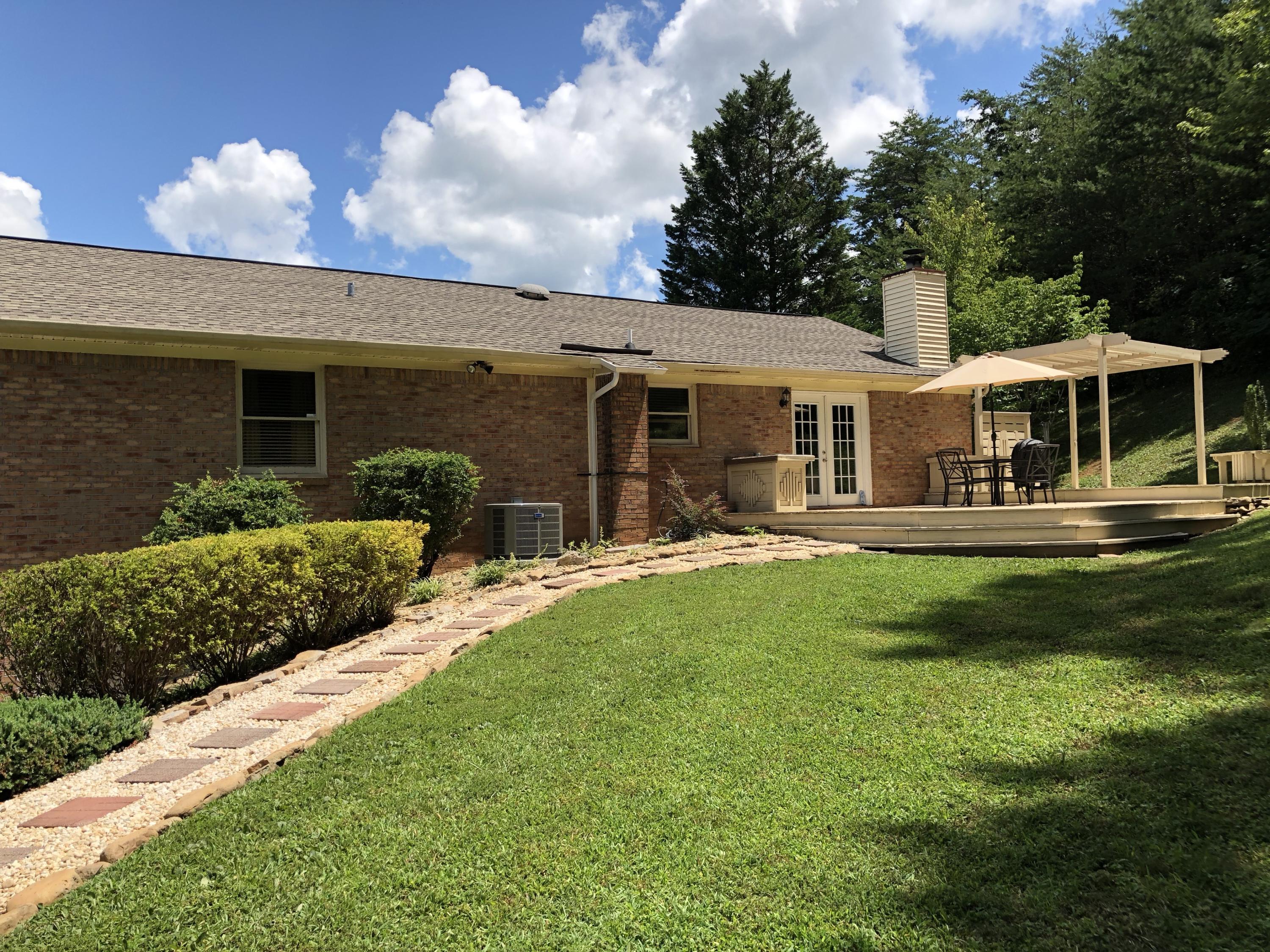 214 Den Lane Heiskell, TN 37754 - Photo 8 of 40 back walk way