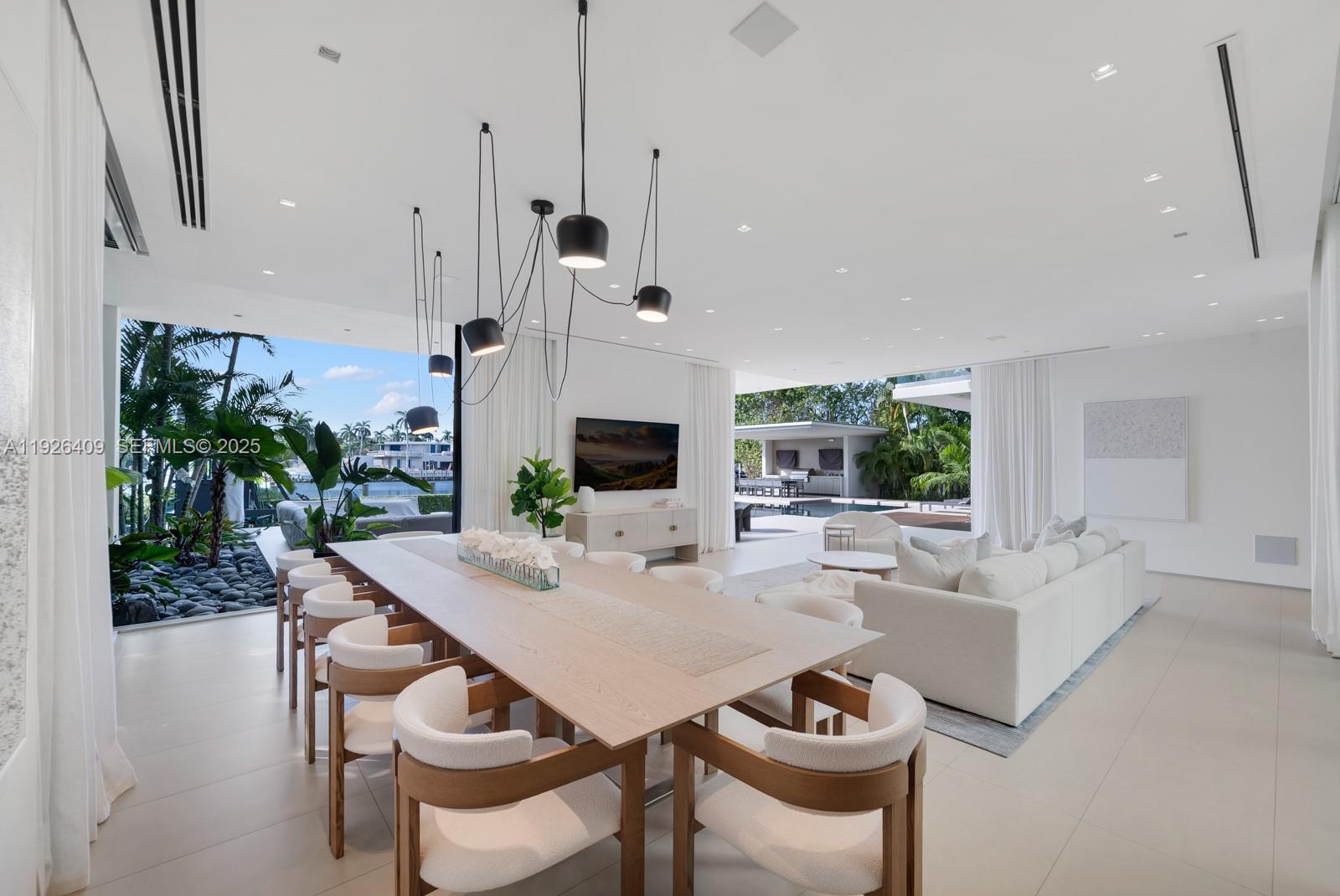 6480 Allison Road Miami Beach, FL 33141 - Photo 14 of 66 a view of a dining room and furniture