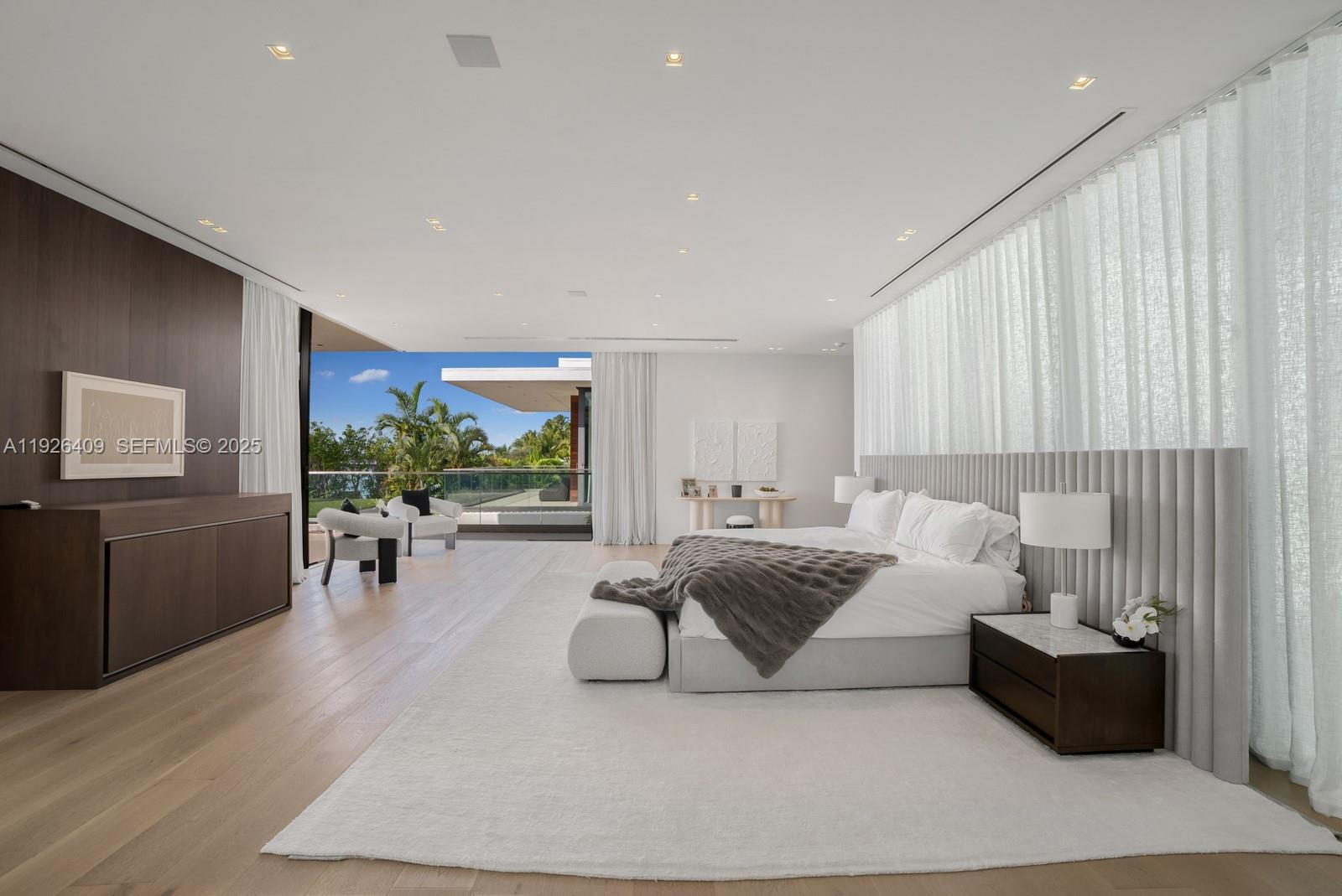 6480 Allison Road Miami Beach, FL 33141 - Photo 55 of 66 a living room with furniture and a large window