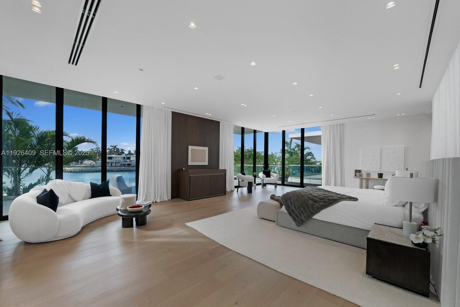 6480 Allison Road Miami Beach, FL 33141 - Photo 57 of 66 a living room with furniture and a large window