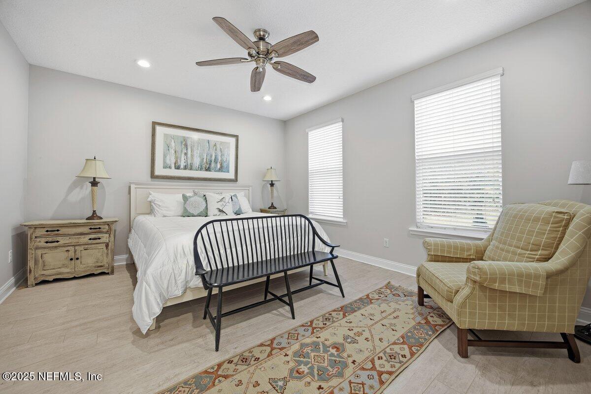 75 Myrtle Park Point Ponte Vedra, FL 32081 - Photo 15 of 38 a bedroom with furniture and a window