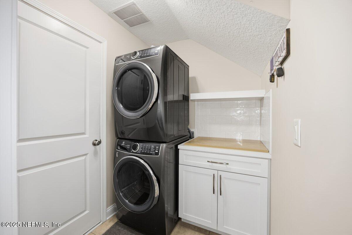 75 Myrtle Park Point Ponte Vedra, FL 32081 - Photo 22 of 38 a utility room with sink dryer and washer