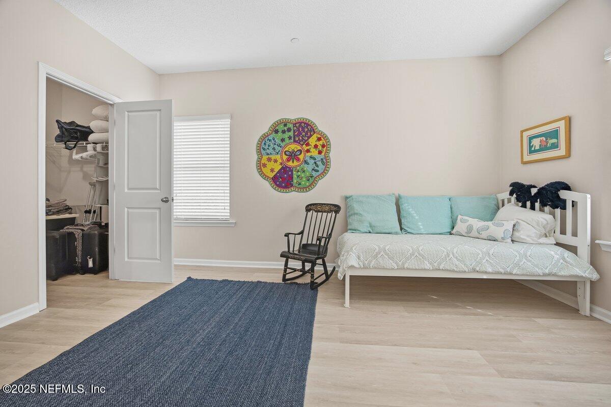 75 Myrtle Park Point Ponte Vedra, FL 32081 - Photo 25 of 38 a living room with furniture and a wooden floor