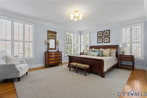 a white bath tub sitting next to a window