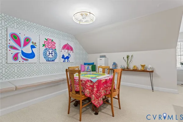 a view of a patio with couches and a table and chairs