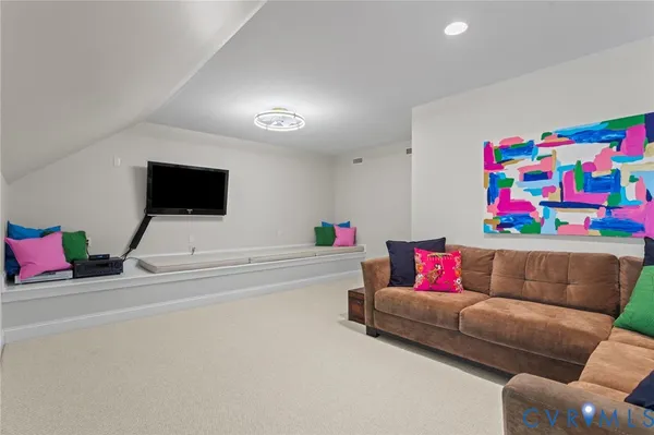 a view of a park with bench and trees