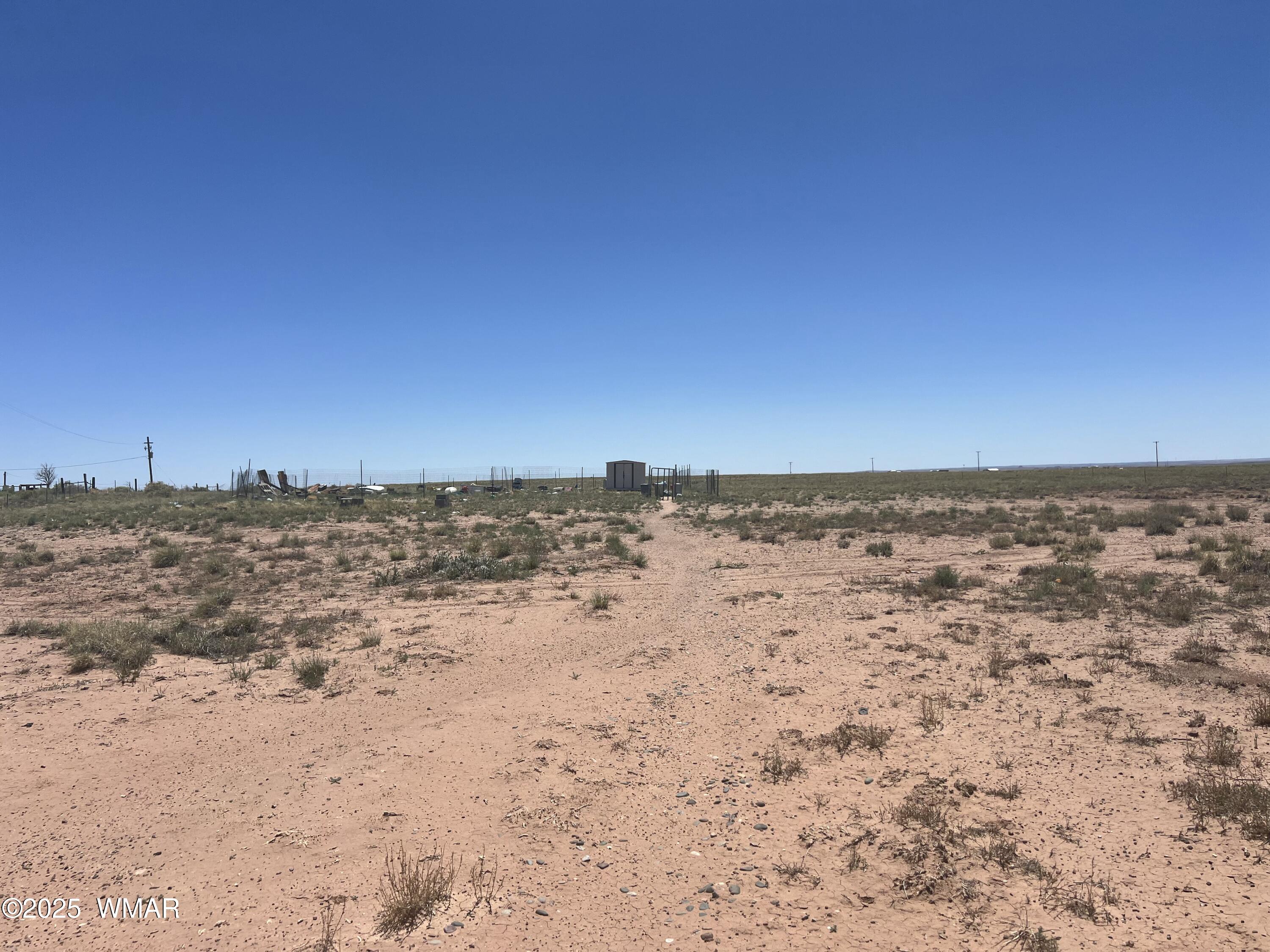 7736 Sandhill Road Sun Valley, AZ 86029 - Photo 11 of 13 a view of beach and an ocean