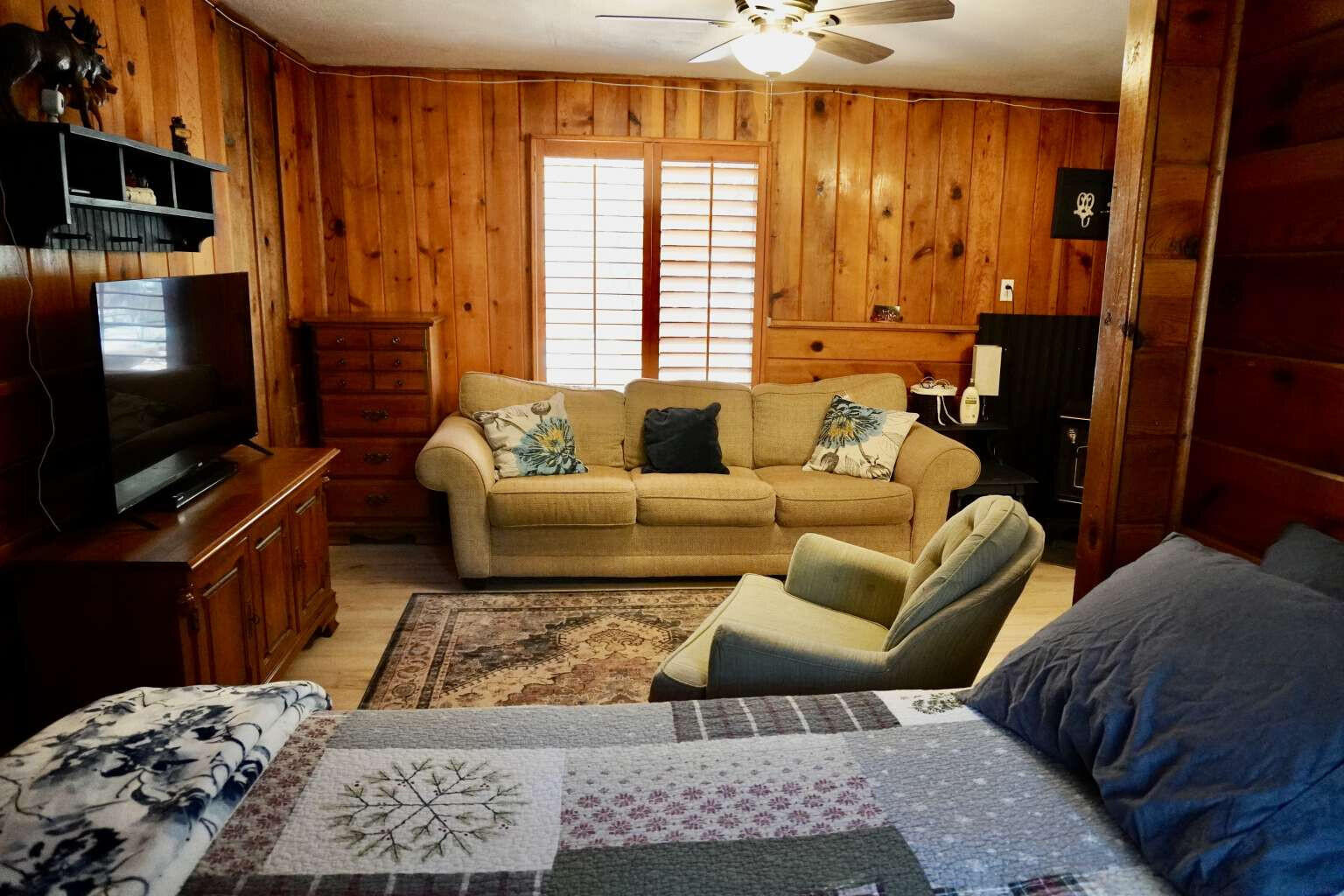 167 South Ranch Lane Payson, AZ 85541 - Photo 8 of 40 a living room with furniture fireplace and a flat screen tv