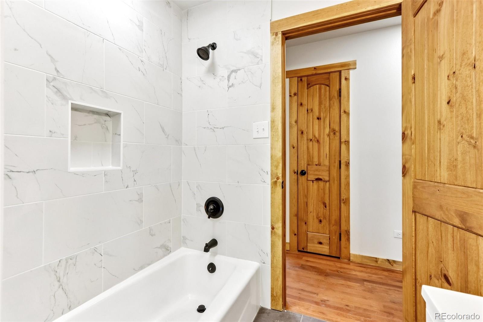 61 Evergreen Road Black Hawk, CO 80422 - Photo 20 of 50 a bathroom with a bathtub