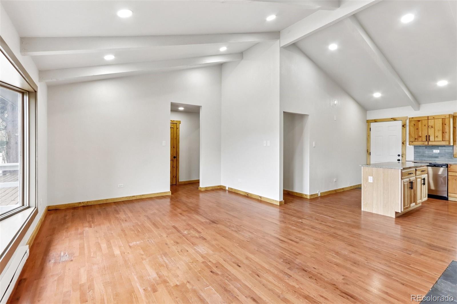 61 Evergreen Road Black Hawk, CO 80422 - Photo 31 of 50 a view of empty room with wooden floor and window