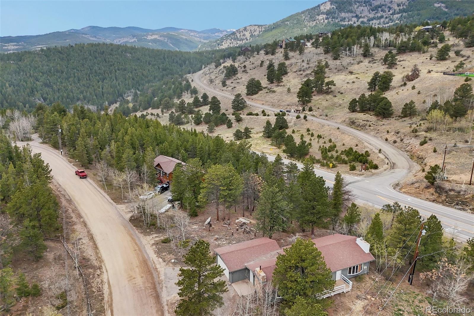 61 Evergreen Road Black Hawk, CO 80422 - Photo 42 of 50 a view of a houses with a yard