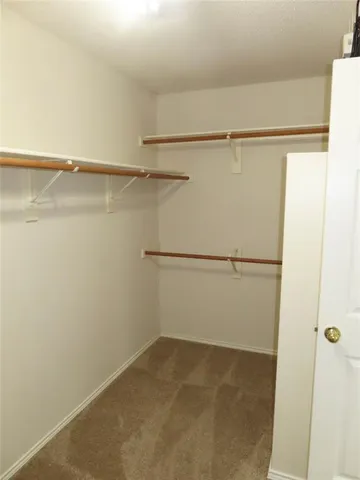 a view of small space with racks on the wall