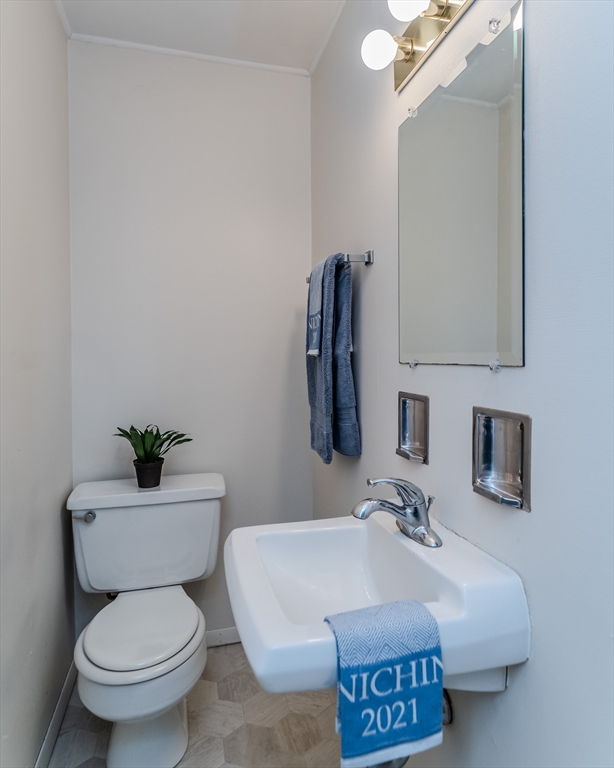 170 East Hadley Road, Unit 123 Amherst, MA 01002 - Photo 14 of 23 a bathroom with a sink a toilet and mirror