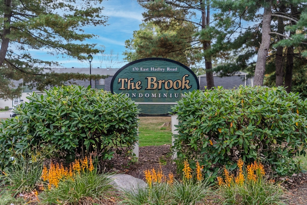 170 East Hadley Road, Unit 123 Amherst, MA 01002 - Photo 23 of 23 a view of a sign of a park next to a road