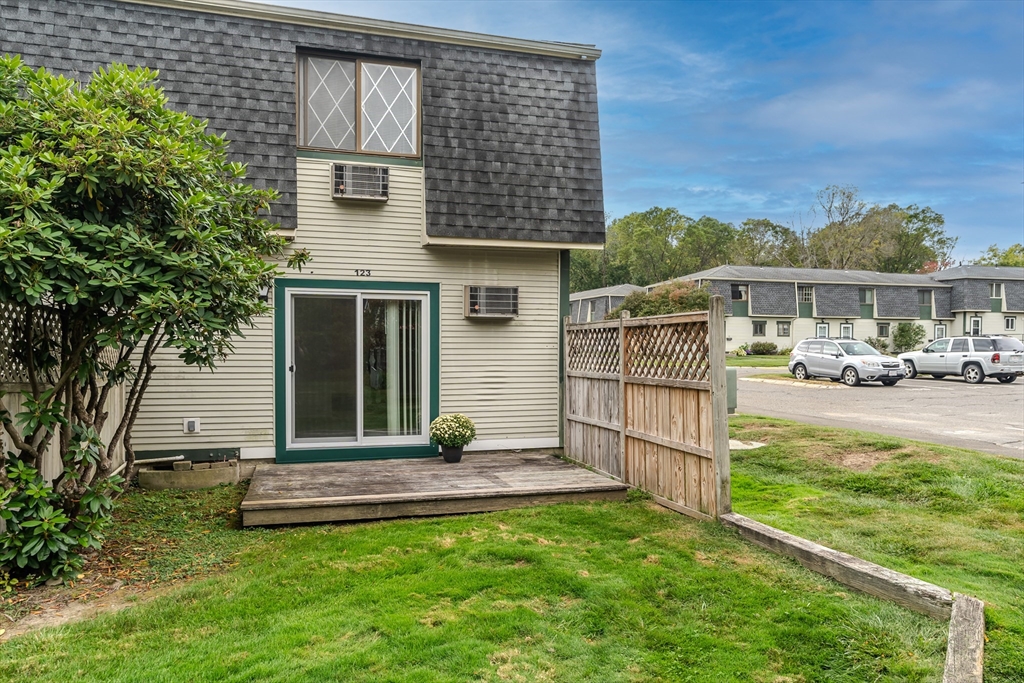 170 East Hadley Road, Unit 123 Amherst, MA 01002 - Photo 5 of 23 front view of house with a yard