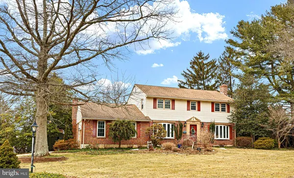a front view of a house with swimming pool