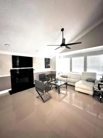 a kitchen with stainless steel appliances a refrigerator and a stove top oven
