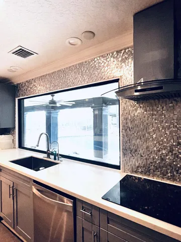 a living room with furniture tv and a fireplace