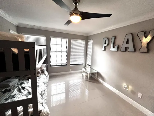 a bathroom with a sink and mirror with toilet