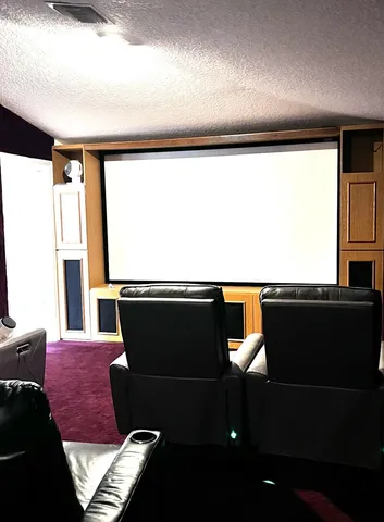 a view of swimming pool with outdoor seating