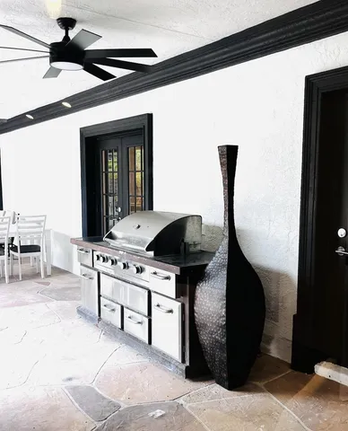 a view of a swimming pool with a patio